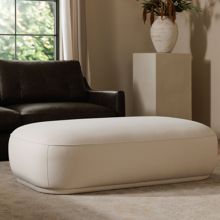 Elevate Living: Curvaceous Performance-Fabric Ottoman