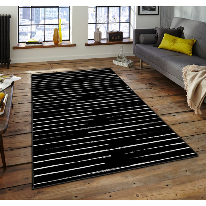 Rectangle Elwood Striped Machine Made Power Loom Polyester Area Rug in Black/White East Urban Home Rug Size: Rectangle 5'11" x 9'2"