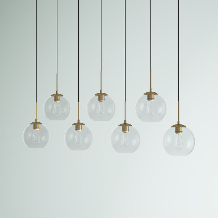 Jerricha 7 - Light Cluster Globe Pendant George Oliver Shade Color/Pattern: Clear Finish: Brass