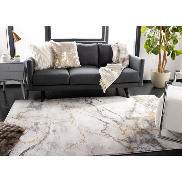 Swindle Abstract Grey/Gold Area Rug Wade Logan® Rug Size: Rectangle 9' x 12'