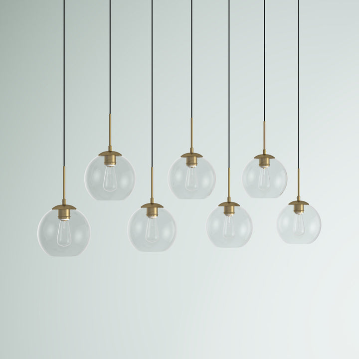 Jerricha 7 - Light Cluster Globe Pendant George Oliver Shade Color/Pattern: Clear Finish: Brass