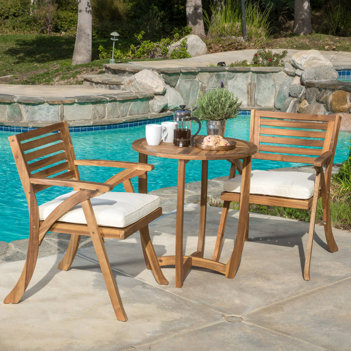 Round 2 - Person 28" Long Bistro Set with Cushions Red Barrel Studio® Frame Color/Cushion Color: Teak Frame/Cream Cushion