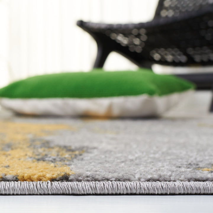 Riebe Abstract Power Loom Polypropylene Area Rug in Gray/Yellow Trent Austin Design® Rug Size: Rectangle 2'6" x 4'