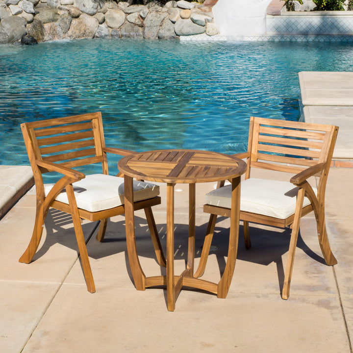 Round 2 - Person 28" Long Bistro Set with Cushions Red Barrel Studio® Frame Color/Cushion Color: Teak Frame/Cream Cushion