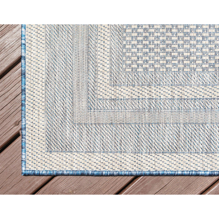 Swanee Blue Indoor / Outdoor Area Rug Arlmont & Co. Rug Size: Rectangle 3'3" x 5'3"