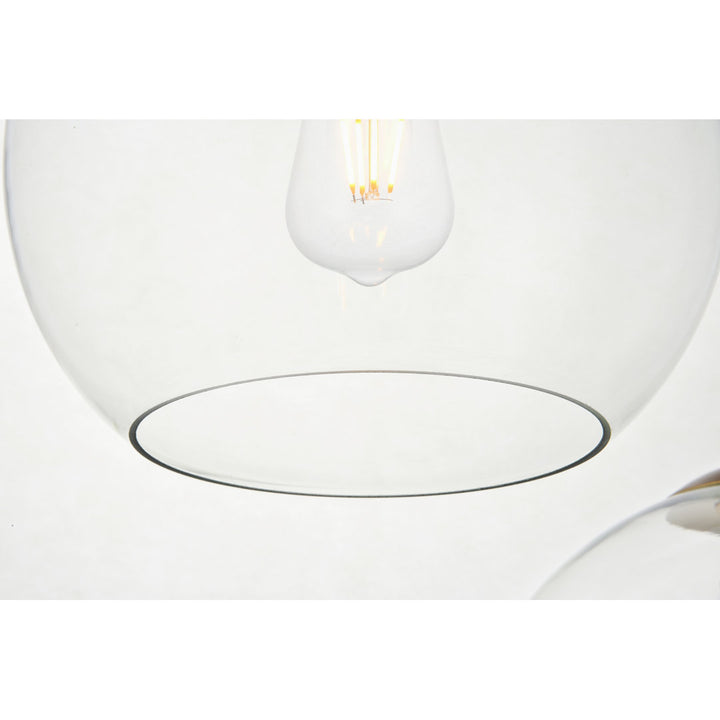 Jerricha 7 - Light Cluster Globe Pendant George Oliver Shade Color/Pattern: Clear Finish: Brass