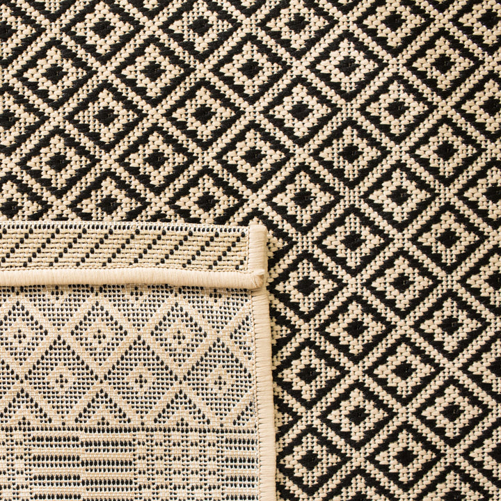Arneshia Geometric Beige Indoor / Outdoor Area Rug Wade Logan® Rug Size: Rectangle 5'3" x 7'7"