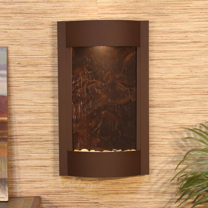 Serene Waters Natural Stone/Metal Wall Fountain with Light Adagio Fountains Finish: Silver Metallic