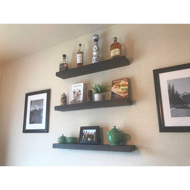 Eneas Pine Solid Wood Floating Shelf Millwood Pines Size: 2" H x 36" W x 6" D Finish: Black