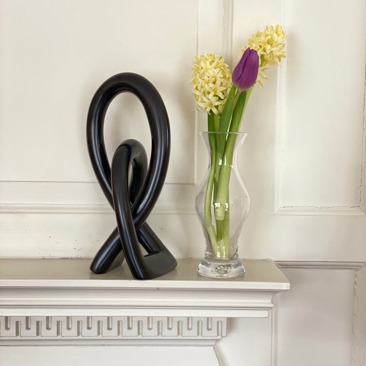 Jeffords Natural Soapstone Lovers Knot Sculpture Ivy Bronx Size: 10" H x 2.5" W x 2" D Finish: Black