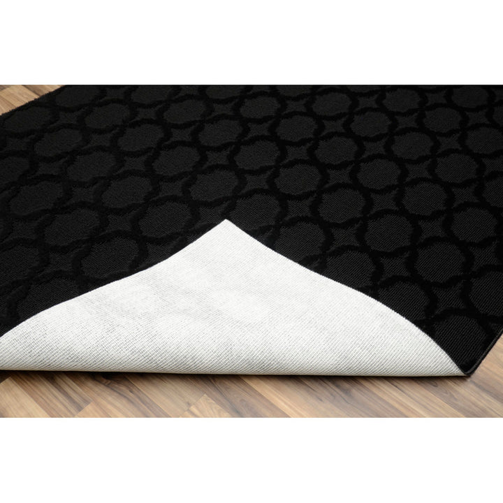 O'Neill Geometric Tufted Black Area Rug Mercer41 Rug Size: Rectangle 5' x 7'