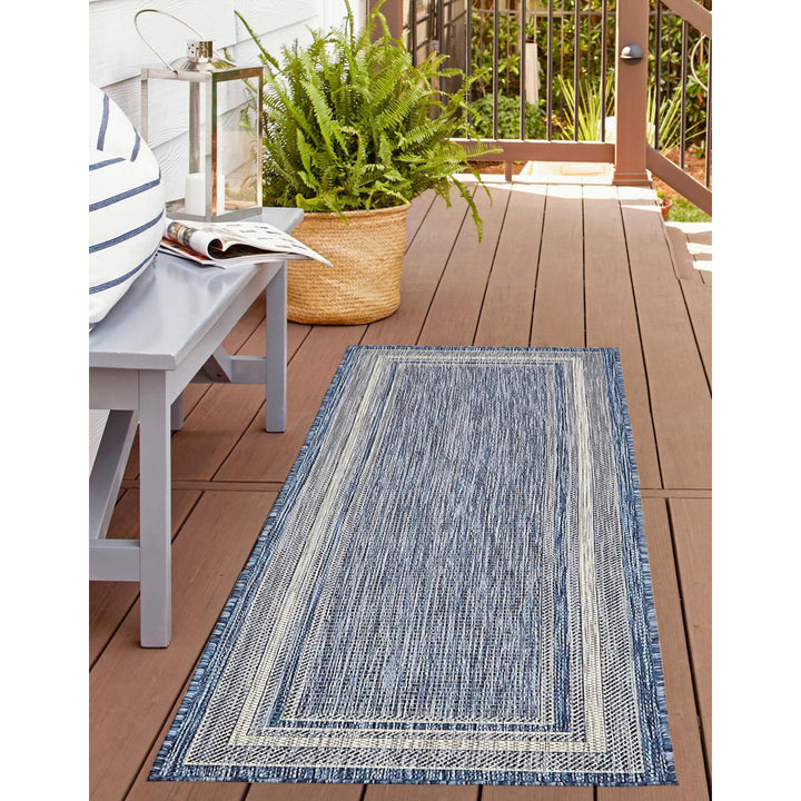 Swanee Blue Indoor / Outdoor Area Rug Arlmont & Co. Rug Size: Runner 2' x 8'