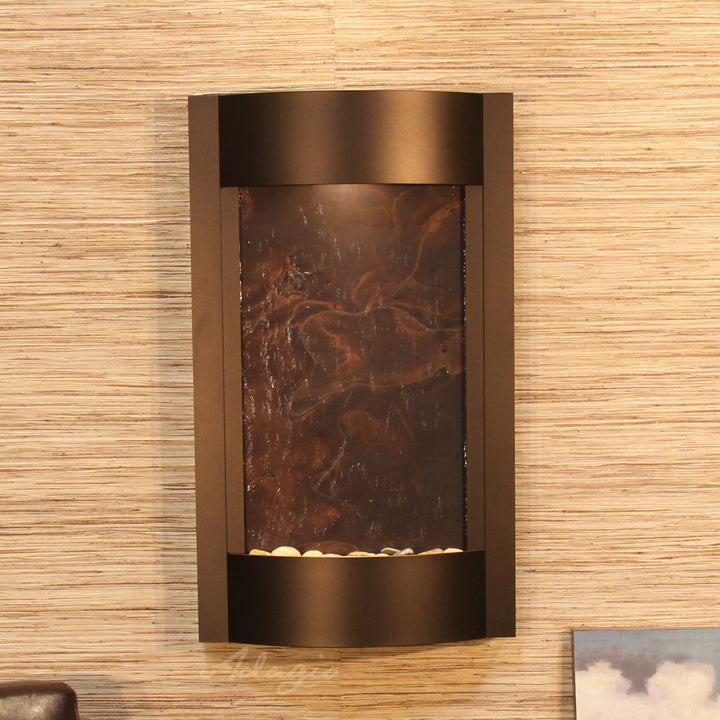 Serene Waters Natural Stone/Metal Wall Fountain with Light Adagio Fountains Finish: Silver Metallic