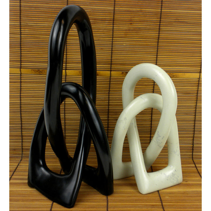 Jeffords Natural Soapstone Lovers Knot Sculpture Ivy Bronx Size: 10" H x 2.5" W x 2" D Finish: Black