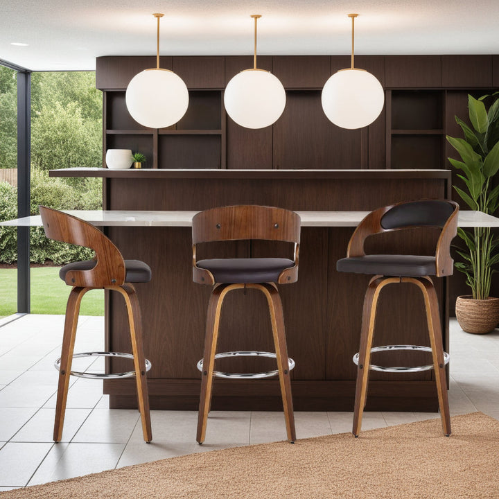 Pensacola Mid-century Swivel Counter Height Bar Stool Corrigan Studio® Seat Height: Bar Stool (30" Seat Height), Upholstery: JY Brown Faux Leather