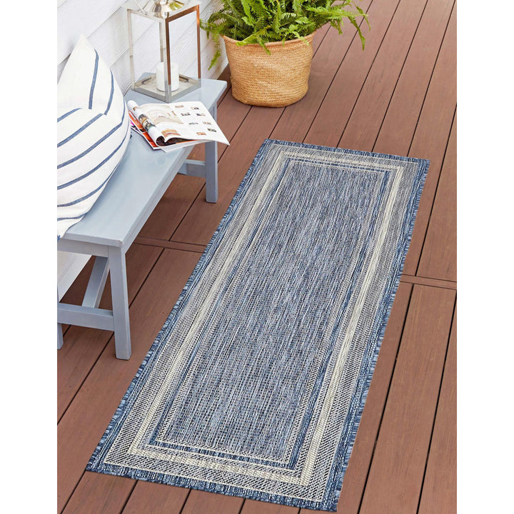 Swanee Blue Indoor / Outdoor Area Rug Arlmont & Co. Rug Size: Runner 2' x 8'
