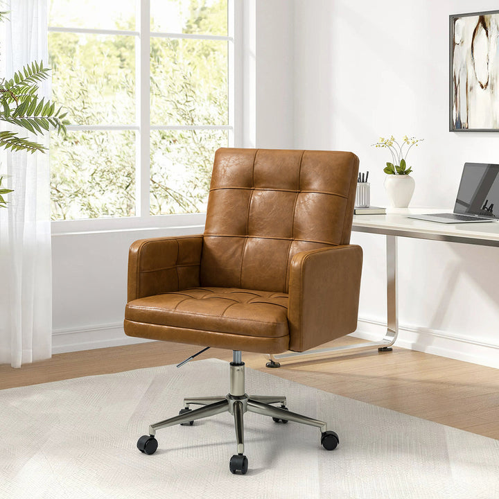 Auric Mid-Century Modern Vegan Leather Height-Adjustable Swivel Office Chair Wade Logan® Upholstery Color: Camel