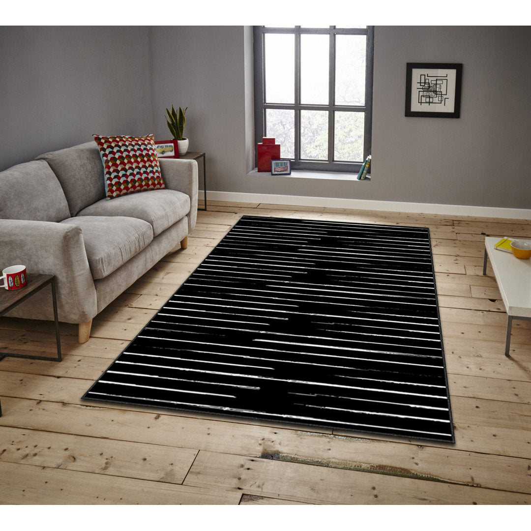 Rectangle Elwood Striped Machine Made Power Loom Polyester Area Rug in Black/White East Urban Home Rug Size: Rectangle 5'11" x 9'2"