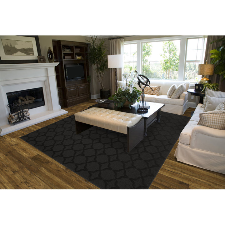 O'Neill Geometric Tufted Black Area Rug Mercer41 Rug Size: Rectangle 5' x 7'
