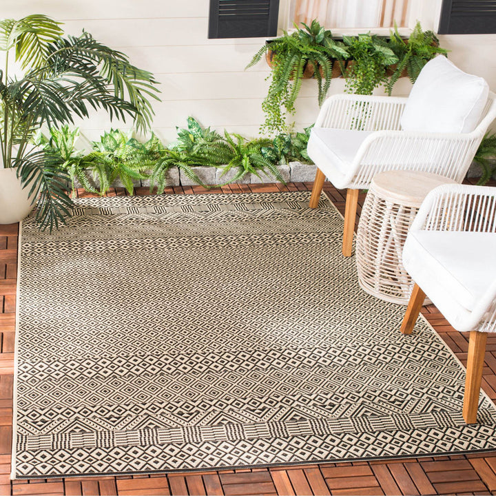 Arneshia Geometric Beige Indoor / Outdoor Area Rug Wade Logan® Rug Size: Rectangle 5'3" x 7'7"