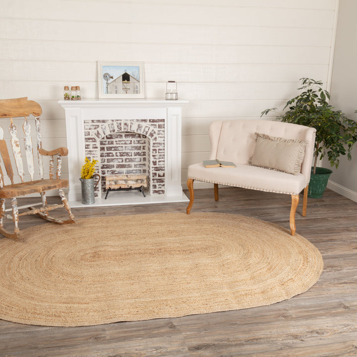 Charbonneau Braided Jute Natural Tan Area Rug Bay Isle Home™ Rug Size: Oval 6' x 9'