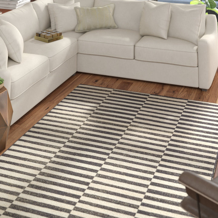 Arzilla Striped Ivory/Black Area Rug Wade Logan® Rug Size: Rectangle 7'1" x 10'