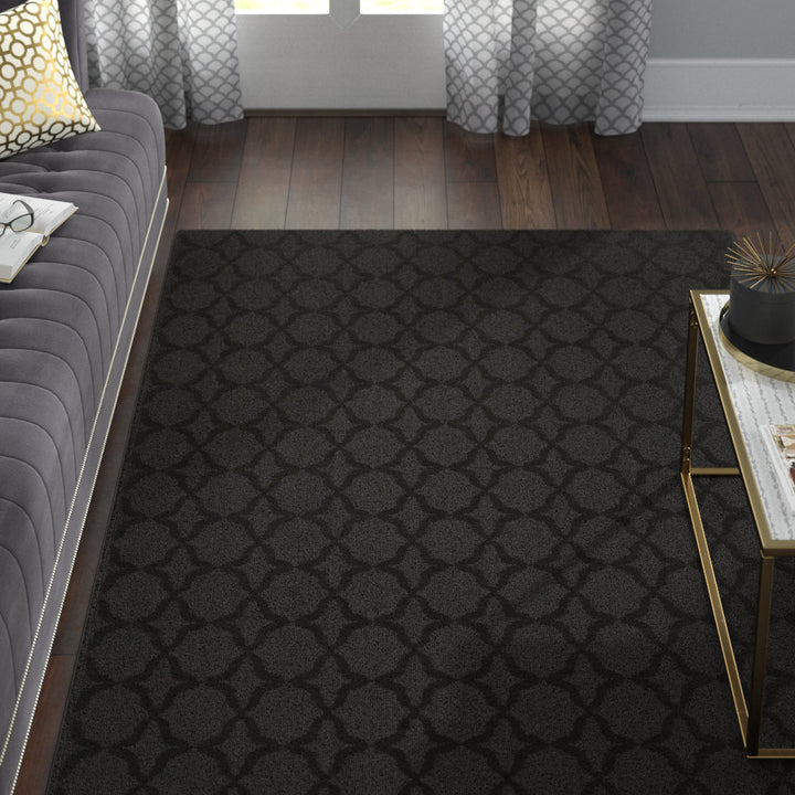 O'Neill Geometric Tufted Black Area Rug Mercer41 Rug Size: Rectangle 5' x 7'