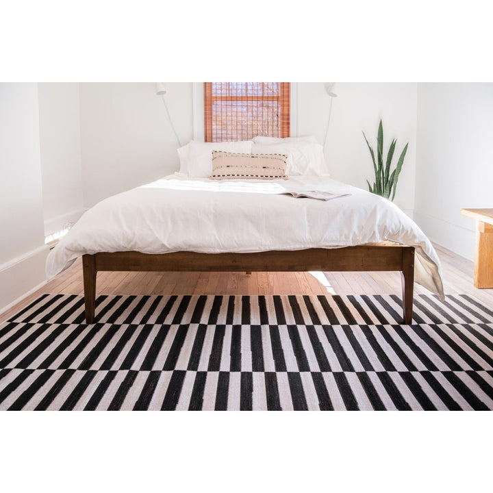 Arzilla Striped Ivory/Black Area Rug Wade Logan® Rug Size: Rectangle 7'1" x 10'