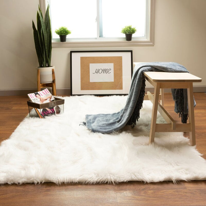Charlotte Handmade Shag Faux Sheepskin White Area Rug-5'x7'