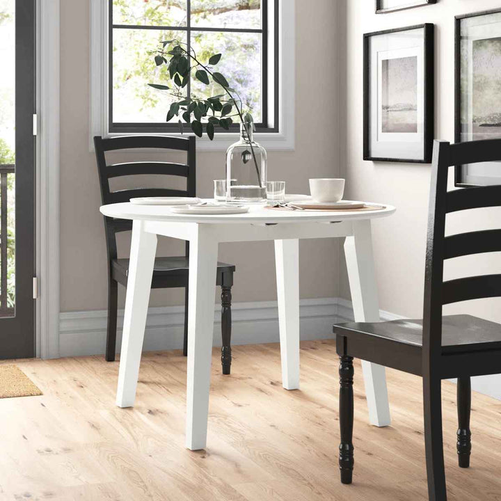 Chaffin Extendable Round Solid Wood Dining Table