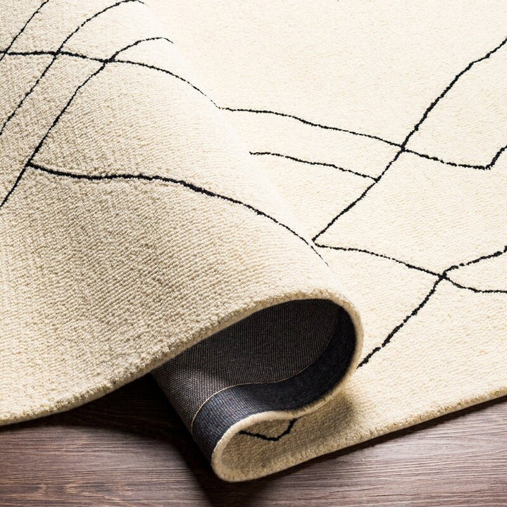 Isla Hand Tufted Wool CreamBlack Rug