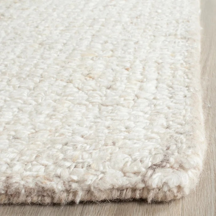 Gaten Handmade Tufted Area Rug in Ivory-9'x12'