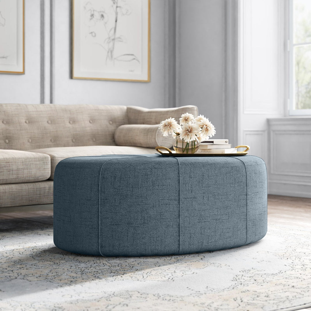 Telly Oval Tufted Cocktail Ottoman