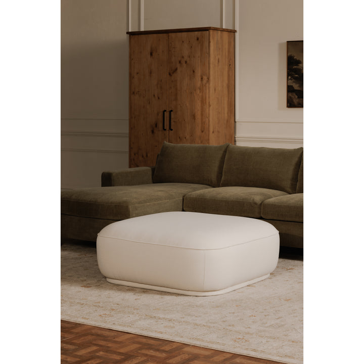 Curvy Comfort Floater: Modern Ottoman with Stain Resistant Upgrade