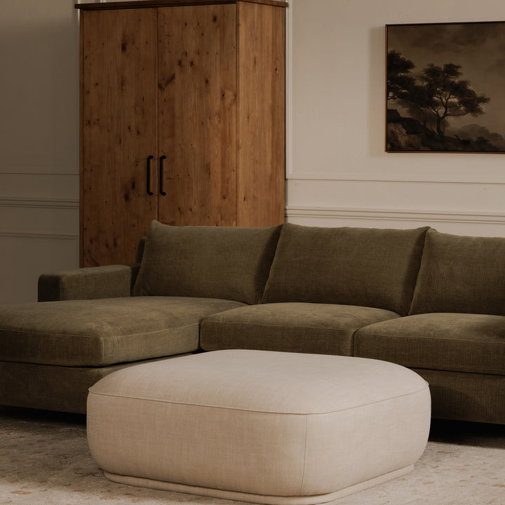 Curvy Comfort Floater: Modern Ottoman with Stain Resistant Upgrade