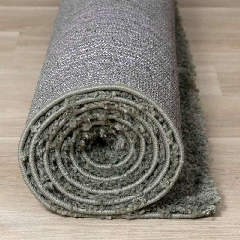 Melnik Solid Colour Machine Woven Polypropylene Area Rug in Sage Green