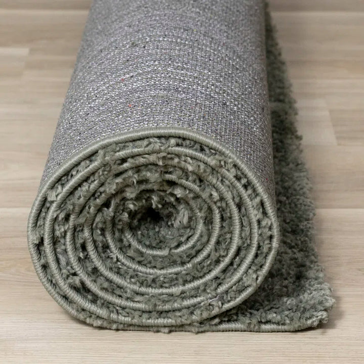 Melnik Solid Colour Machine Woven Polypropylene Area Rug in Sage Green