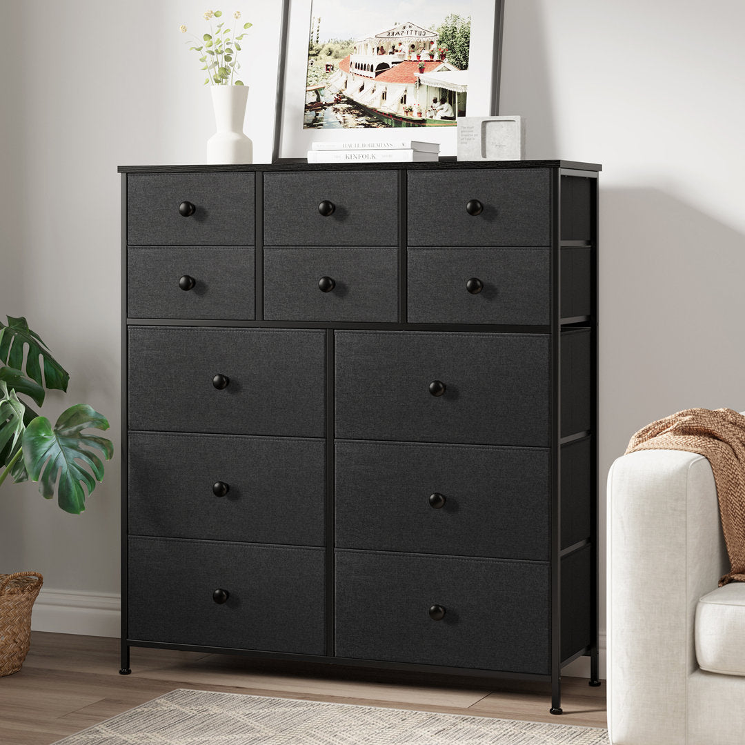Ojaswi Dresser 12 Chest of Drawers, Closet with Wood Ebern Designs Color: Black