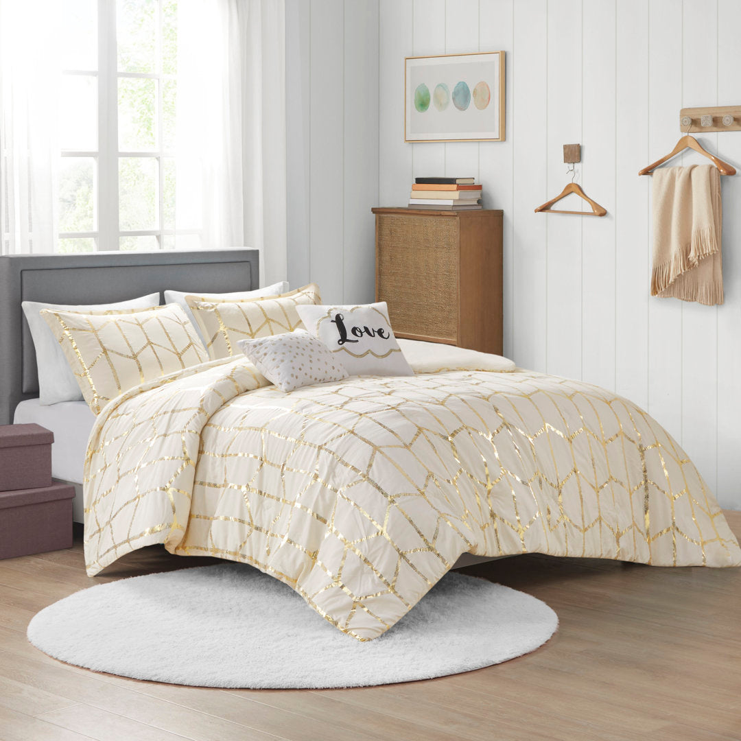 Raina Metallic Printed Comforter Set Intelligent Design Color: Ivory/Gold Size: King/Cal.King Comforter + 2 Shams + 2 Throw Pillow