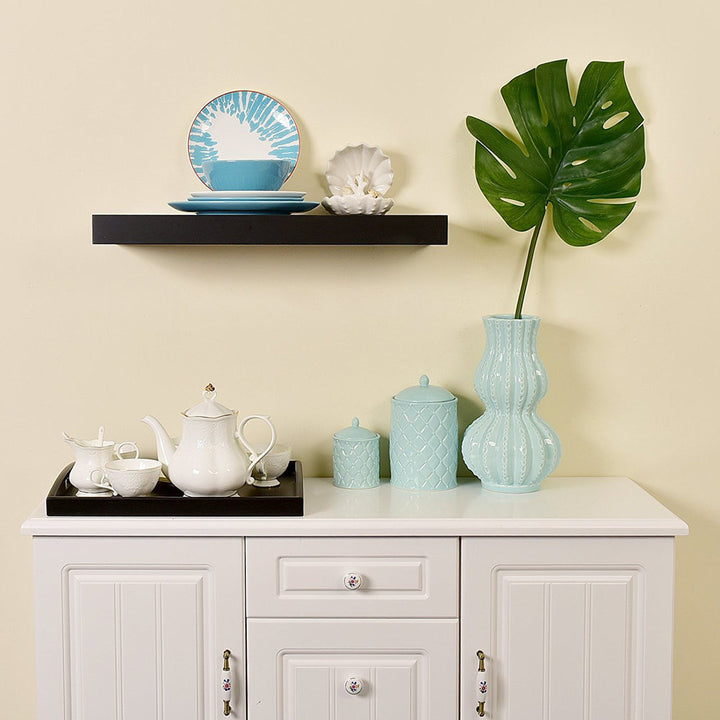 Himmelmann Floating Shelf Ebern Designs Size: 1.25" H x 36" W x 7.25" D Finish: Black