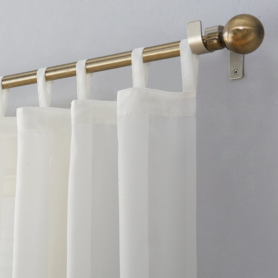 Wayfair Basics® Sheer Tab Top Curtain Panel Wayfair Basics® Curtain Color: Eggshell Size per Panel: 59"W x 63"L