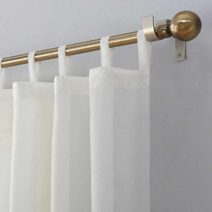Wayfair Basics® Sheer Tab Top Curtain Panel Wayfair Basics® Curtain Color: Eggshell Size per Panel: 59"W x 63"L