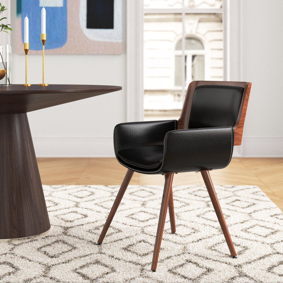 Seagraves Faux Leather Mid-Century Dining Chair Mercury Row® Upholstery Color: Polished Obsidian Faux Leather