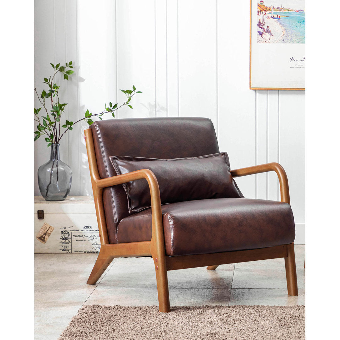 Arsh Accent Chair With Pillow, Pu Upholstery, Rubberwood Legs Wade Logan® Upholstery Color: Dark Brown Polyurethane