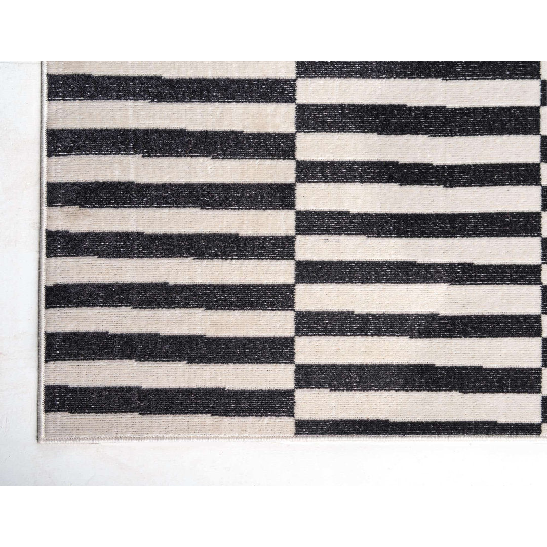 Arzilla Striped Ivory/Black Area Rug Wade Logan® Rug Size: Runner 2'9" x 9'10"