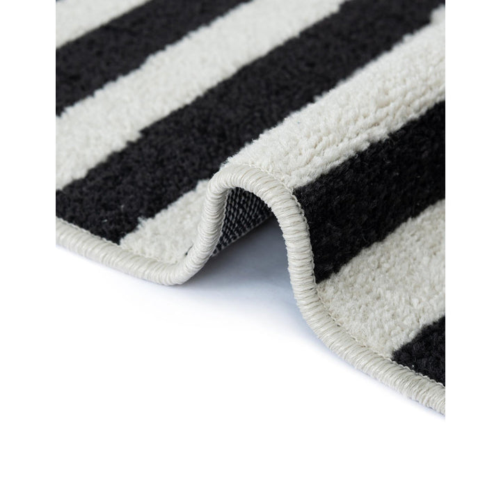 Arzilla Striped Ivory/Black Area Rug Wade Logan® Rug Size: Rectangle 2'2" x 3'1"
