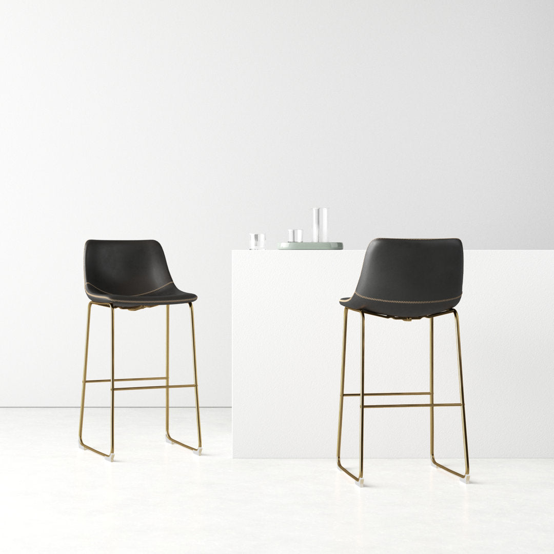 Nia Vegan Leather Bar & Counter Stool (Set of 2) AllModern Frame Color: Gold Upholstery: Black Vegan Leather, Seat Height: Bar Stool (29" Seat Height)