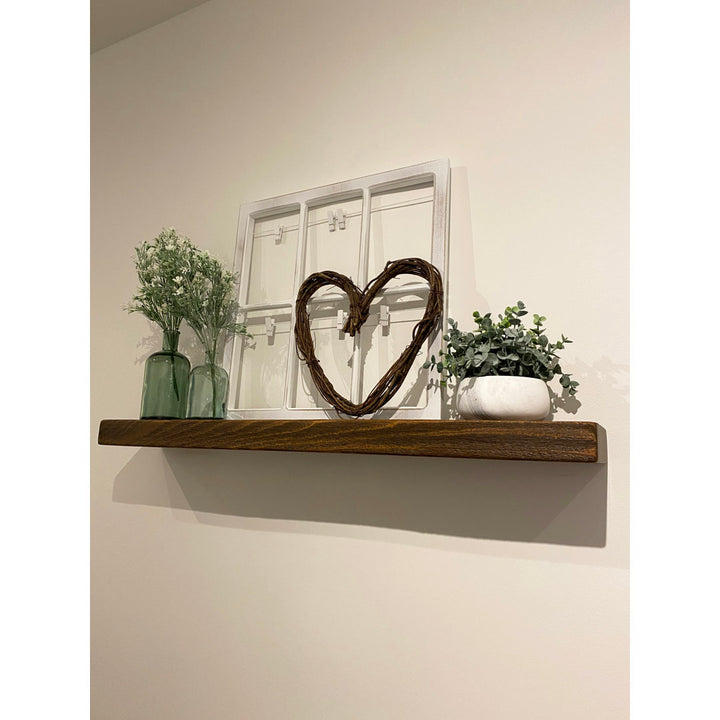 Eneas Pine Solid Wood Floating Shelf Millwood Pines Size: 2" H x 24" W x 6" D Finish: Brown
