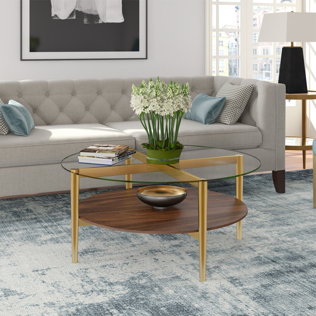 Otto 4 Legs Coffee Table with Storage Wade Logan® Table Base Color: Brown