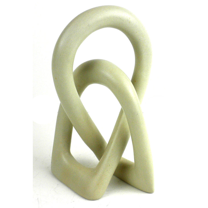Jeffords Natural Soapstone Lovers Knot Sculpture Ivy Bronx Size: 6" H x 4" W x 4" D Finish: Natural